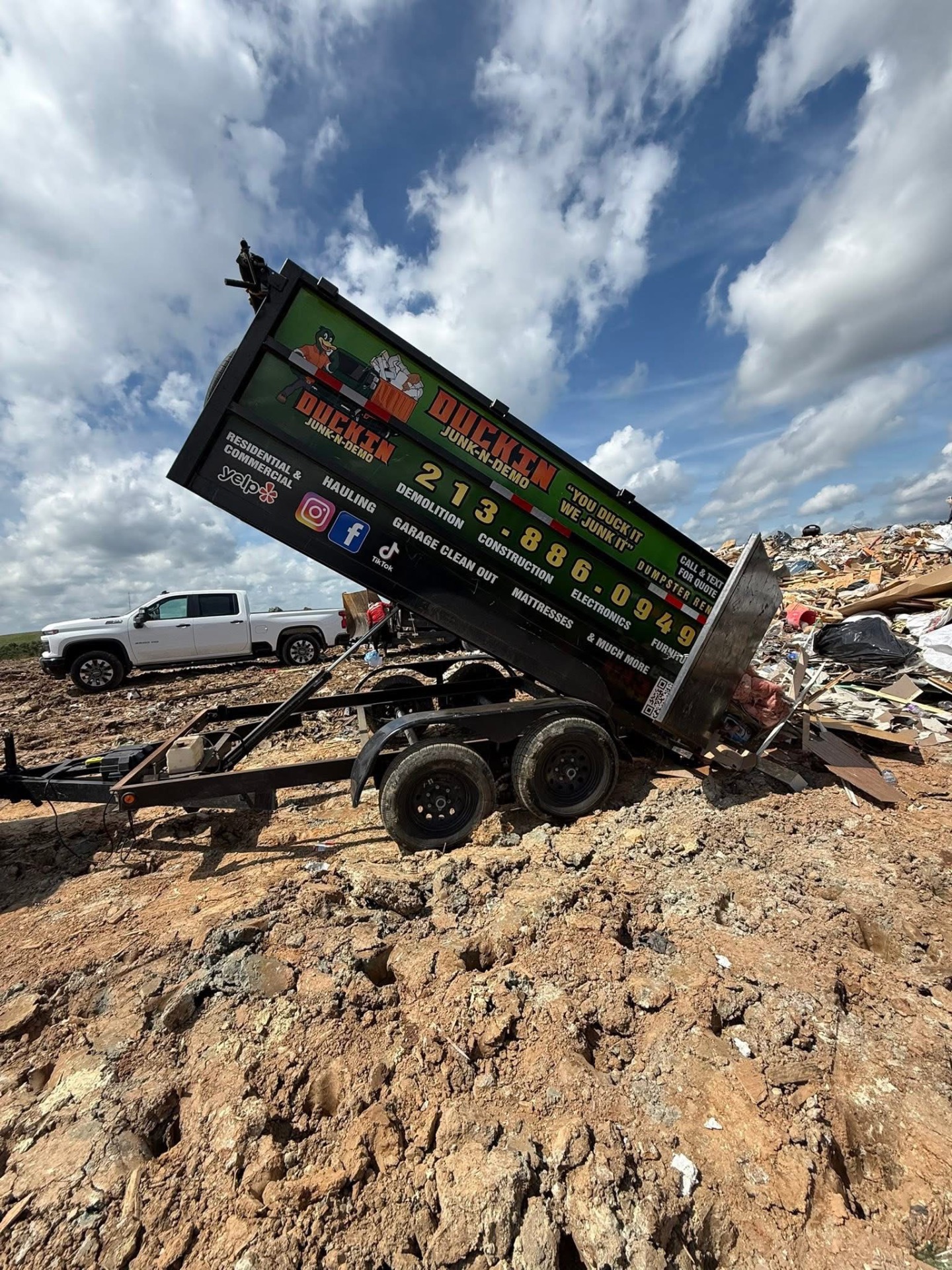 Duckin Junk-N-Demo dumping a load at the landfill
